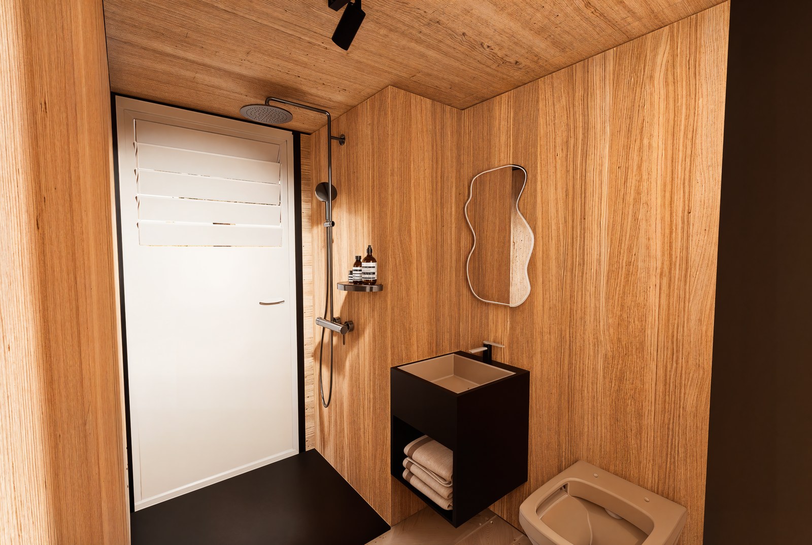 Anyplace bathroom — rain shower, timber walls